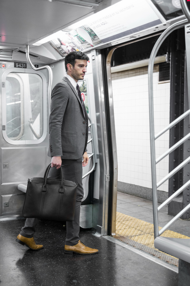 Businessman in a subway car